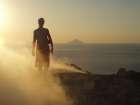 Volcano Fumarole at the Sunset and Filicudi in the Background